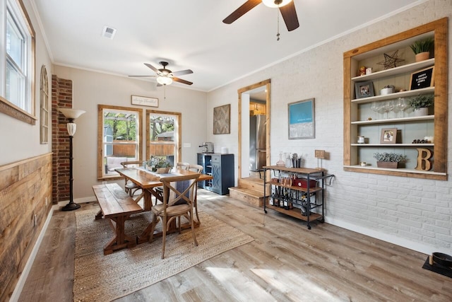 2158 Till Rd, Charleston, SC 29414 - dining space with ceiling fan, wood finished floors, and ornamental molding