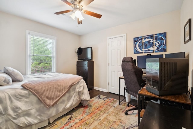 2158 Till Rd, Charleston, SC 29414 - bedroom with wood finished floors, ceiling fan, and an office area
