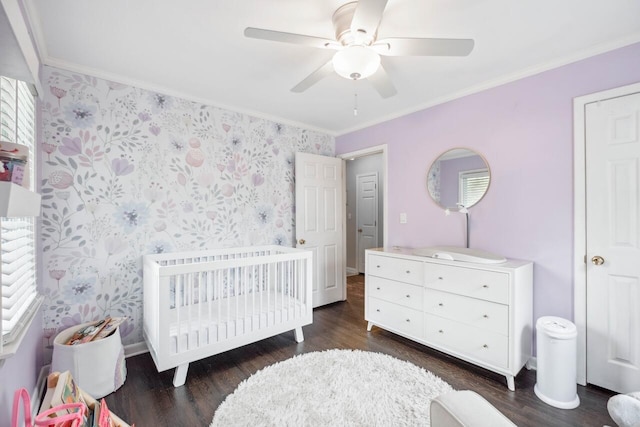 2158 Till Rd, Charleston, SC 29414 - bedroom featuring wood finished floors, a nursery area, ornamental molding, wallpapered walls, and ceiling fan