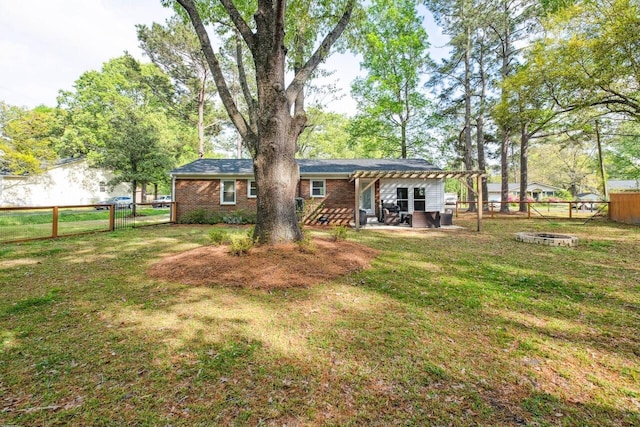 2158 Till Rd, Charleston, SC 29414 - rear view of house with an outdoor fire pit, a pergola, a fenced backyard, a patio, and brick siding