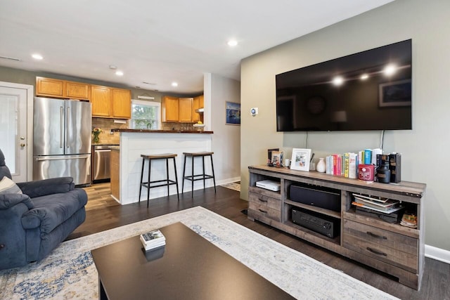 2158 Till Rd, Charleston, SC 29414 - living room featuring dark wood-type flooring and recessed lighting
