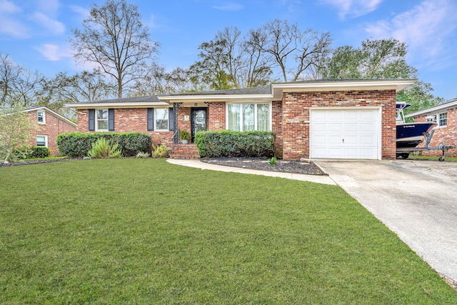 ranch-style home with a garage and a front lawn