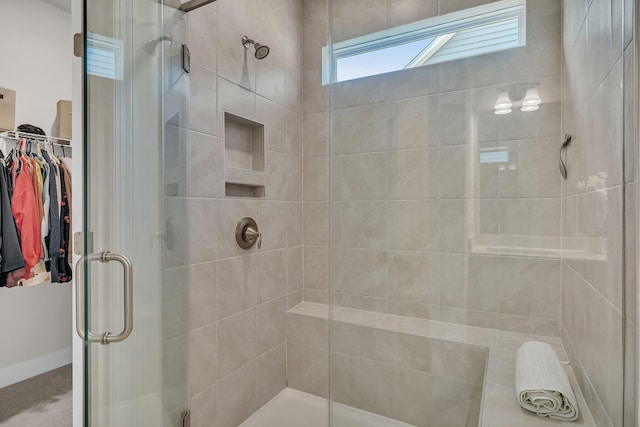 bathroom featuring an enclosed shower