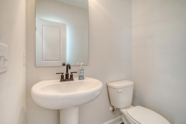 299 Lucca Dr, Summerville, SC 29486 - bathroom with toilet and a sink