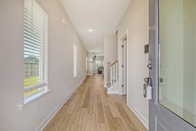 299 Lucca Dr, Summerville, SC 29486 - hallway with light wood finished floors, stairway, and recessed lighting
