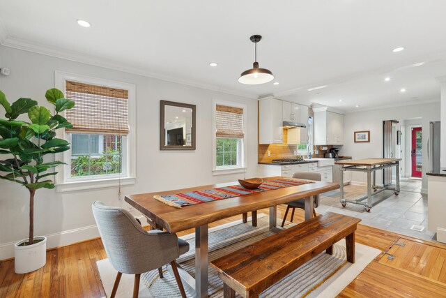 293 Grove St, Charleston, SC 29403 - dining room featuring baseboards, ornamental molding, light wood-style flooring, and recessed lighting