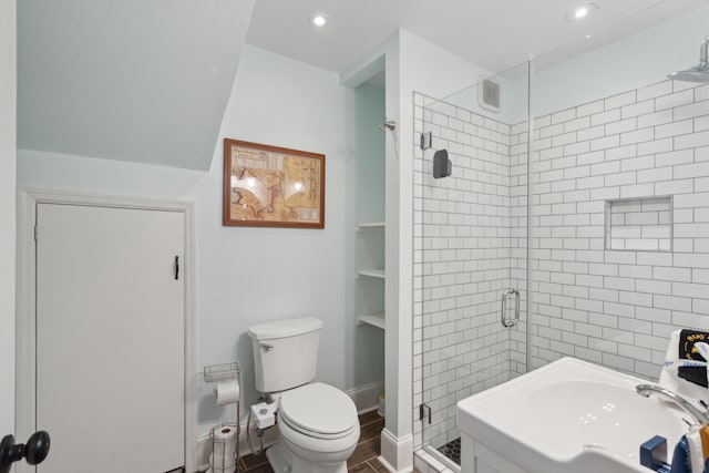293 Grove St, Charleston, SC 29403 - full bathroom featuring a stall shower, toilet, and recessed lighting