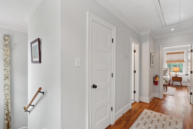 293 Grove St, Charleston, SC 29403 - hall featuring attic access, an upstairs landing, hardwood / wood-style flooring, ornamental molding, and baseboards