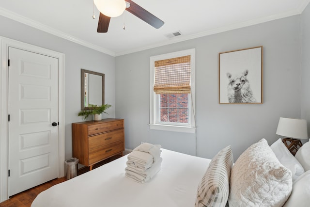 293 Grove St, Charleston, SC 29403 - bedroom with ornamental molding, dark wood-type flooring, and a ceiling fan