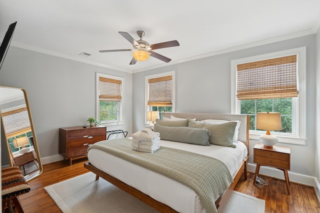 293 Grove St, Charleston, SC 29403 - bedroom featuring ornamental molding, wood finished floors, multiple windows, and baseboards