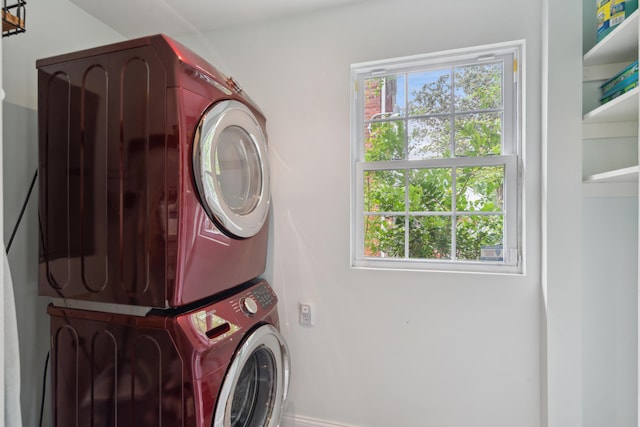 293 Grove St, Charleston, SC 29403 - laundry area with estacked washer and dryer, healthy amount of natural light, and baseboards