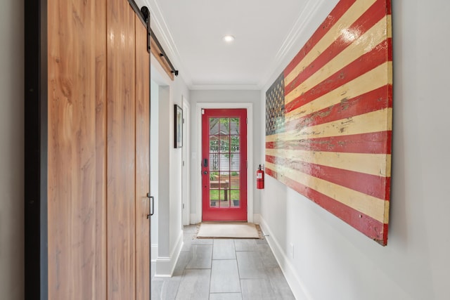 293 Grove St, Charleston, SC 29403 - doorway to outside with a barn door, crown molding, baseboards, tile patterned floors, and recessed lighting