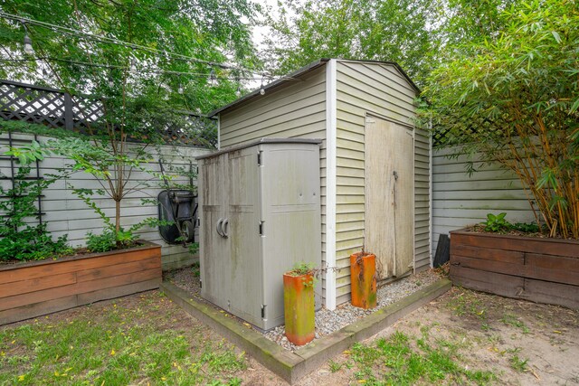 293 Grove St, Charleston, SC 29403 - view of shed featuring a fenced backyard