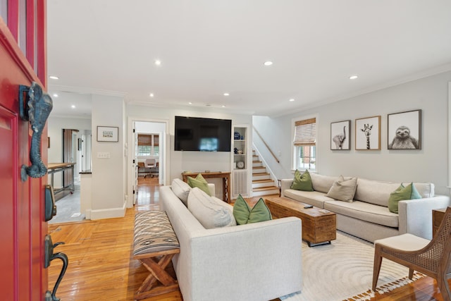 293 Grove St, Charleston, SC 29403 - living room featuring crown molding, stairway, recessed lighting, light wood finished floors, and baseboards