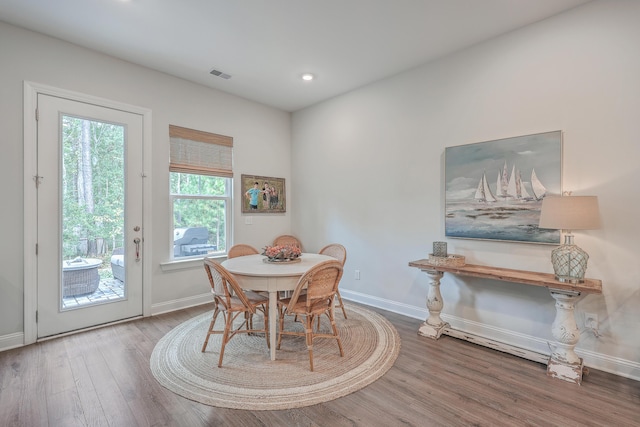 dining area featuring hardwood / wood-style flooring