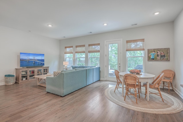 dining room with light hardwood / wood-style flooring