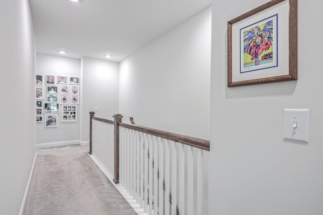 hallway with light carpet