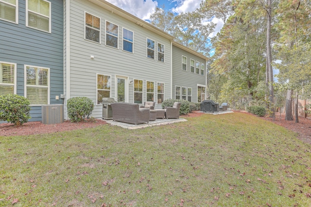 back of property with an outdoor hangout area, a yard, and a patio