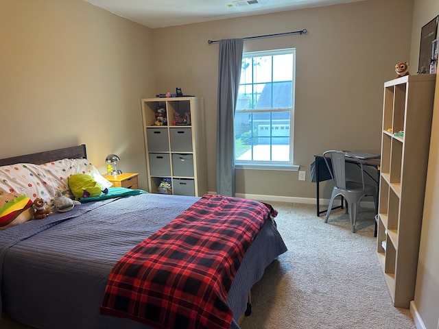 677 Redbud Ln, Summerville, SC 29486 - carpeted bedroom featuring multiple windows and baseboards