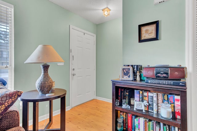 foyer featuring hardwood / wood-style flooring