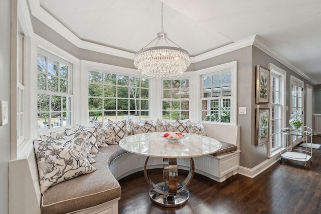 sunroom featuring an inviting chandelier