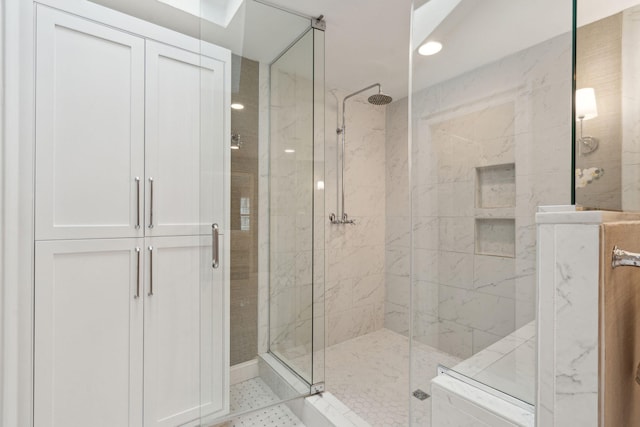 full bathroom featuring a shower stall