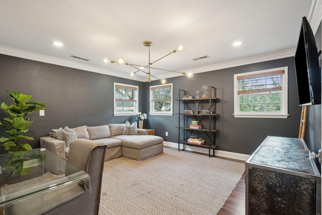 living room featuring baseboards, visible vents, and ornamental molding