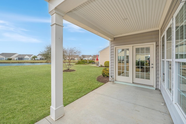 view of patio featuring a water view