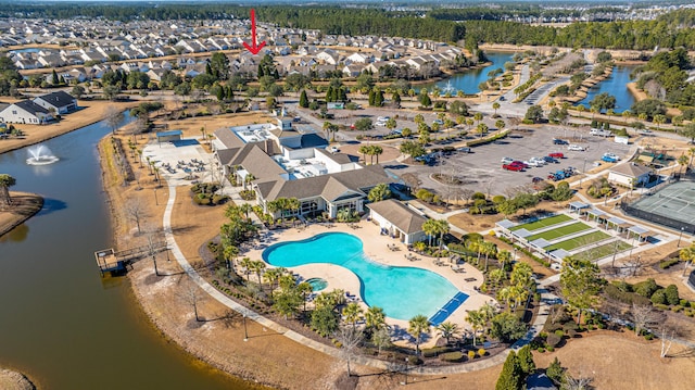 aerial view featuring a water view and a residential view