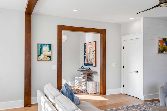 interior space with light wood finished floors, baseboards, and recessed lighting