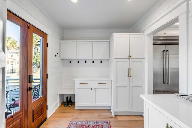 mudroom with light wood-type flooring