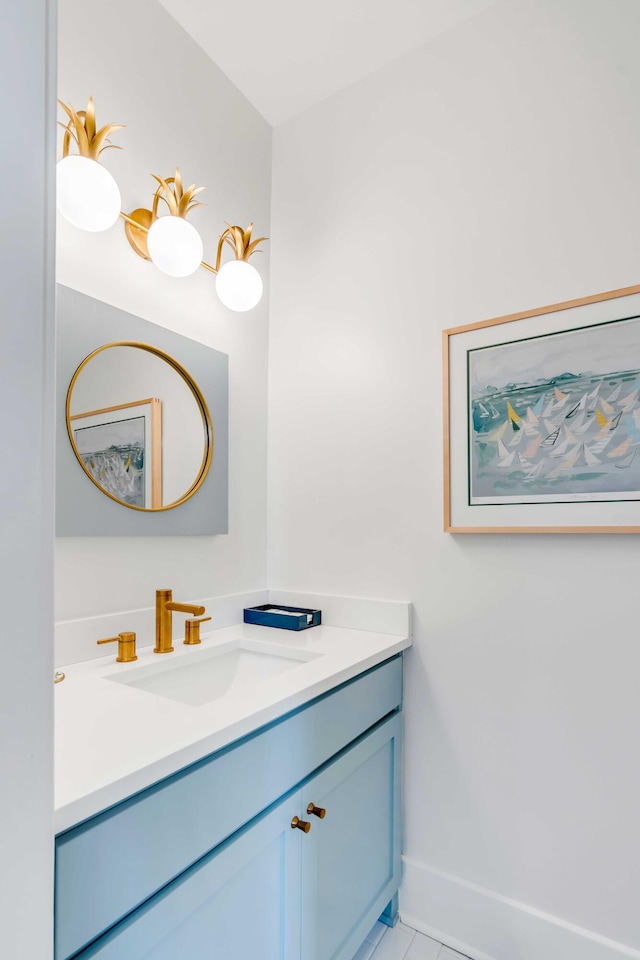 bathroom featuring vanity and baseboards