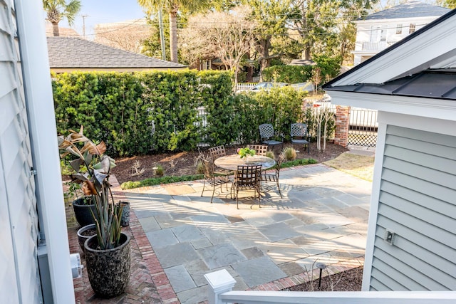 view of patio / terrace with fence and outdoor dining area