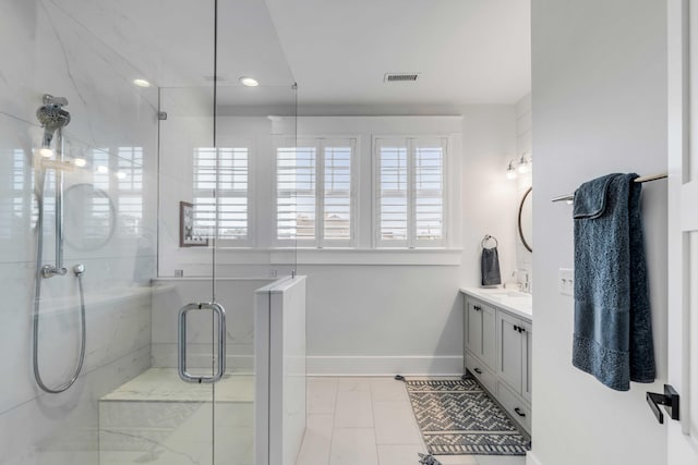 bathroom featuring recessed lighting, visible vents, a shower stall, vanity, and baseboards