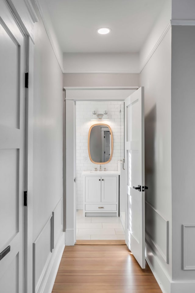 hallway featuring light wood finished floors