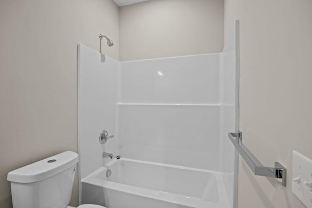 bathroom featuring toilet and shower / bath combination