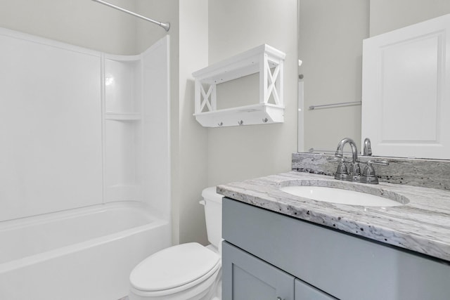 full bathroom with vanity, toilet, and shower / bathtub combination