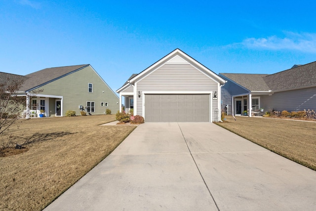 single story home featuring a front yard and a garage