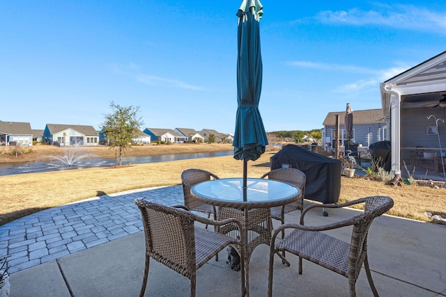 view of patio / terrace featuring a water view