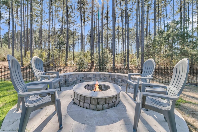 view of patio with a fire pit