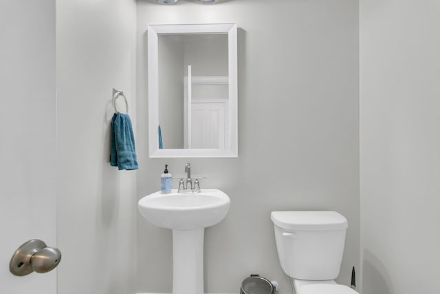 bathroom featuring toilet