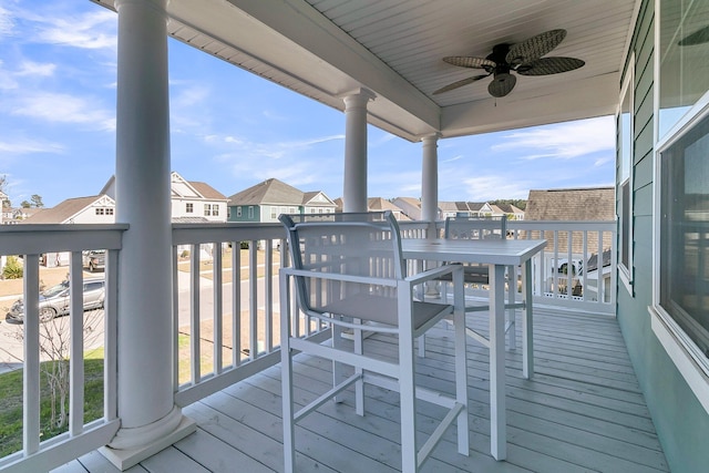 wooden terrace with ceiling fan