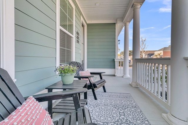 balcony featuring a porch