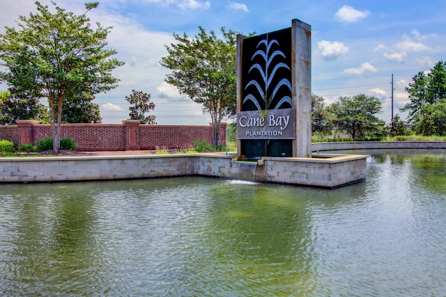 exterior space with a water view