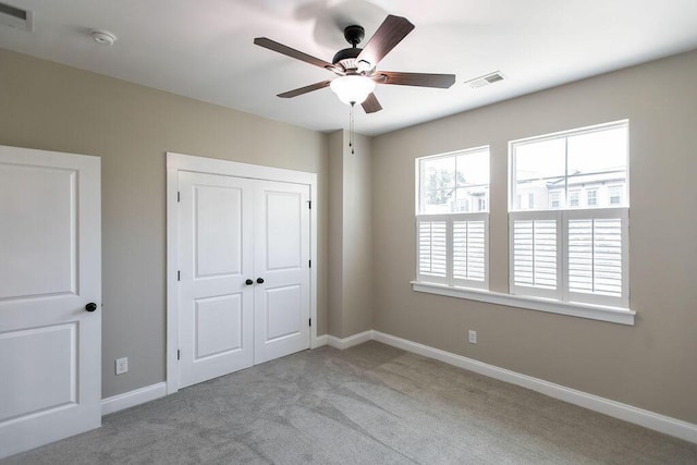 225 Slipper Shell Ct, Mount Pleasant, SC 29464 - unfurnished bedroom with carpet flooring, baseboards, a closet, and ceiling fan