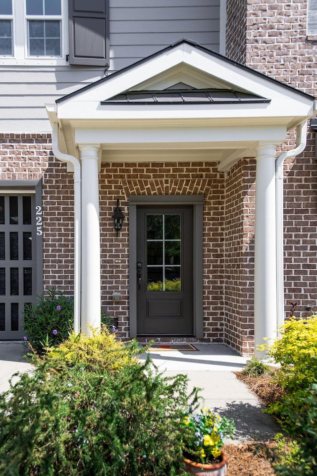 225 Slipper Shell Ct, Mount Pleasant, SC 29464 - view of exterior entry with brick siding
