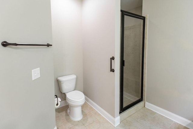 225 Slipper Shell Ct, Mount Pleasant, SC 29464 - full bathroom featuring tile patterned floors, a stall shower, toilet, and baseboards