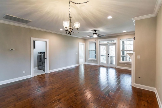 225 Slipper Shell Ct, Mount Pleasant, SC 29464 - empty room with washing machine and clothes dryer, baseboards, a chandelier, crown molding, and french doors