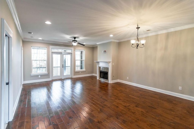 225 Slipper Shell Ct, Mount Pleasant, SC 29464 - unfurnished living room featuring baseboards, dark wood finished floors, a premium fireplace, recessed lighting, and a chandelier
