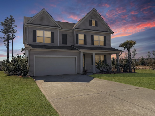 view of front of property with a garage, a front yard, driveway, and a porch